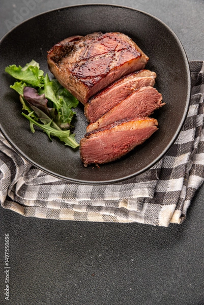 Obraz Duck breast roast meat poultry fresh delicious gourmet food background on the table rustic food top view copy space