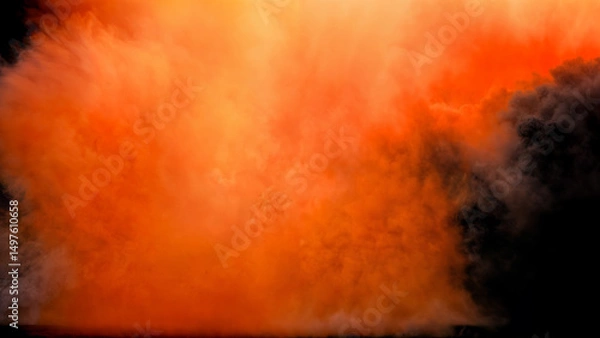 Fototapeta Large explosion with a massive cloud of smoke illuminated by a bright and fiery orange burst of light on a black background