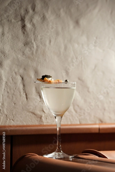 Fototapeta Modern Cocktail with Unique Garnish on a Bar Counter