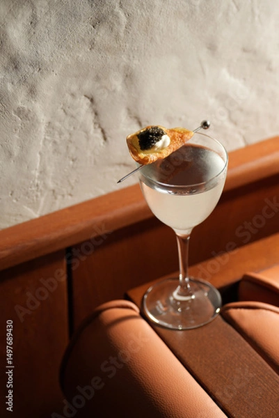 Fototapeta Modern Cocktail with Unique Garnish on a Bar Counter