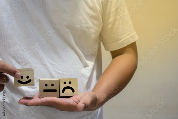 Obraz smile face and cart icon on wooden cube, optimistic person or people feeling inside, satisfaction concept in business