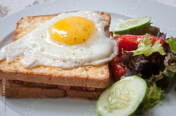 Fototapeta Sandwiches with white bread bacon and egg .