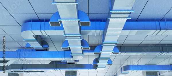 Obraz Ceiling-mounted industrial HVAC duct system with multiple air vents, used for air circulation and temperature control in commercial buildings. HVAC. Construction. Infrastructure.