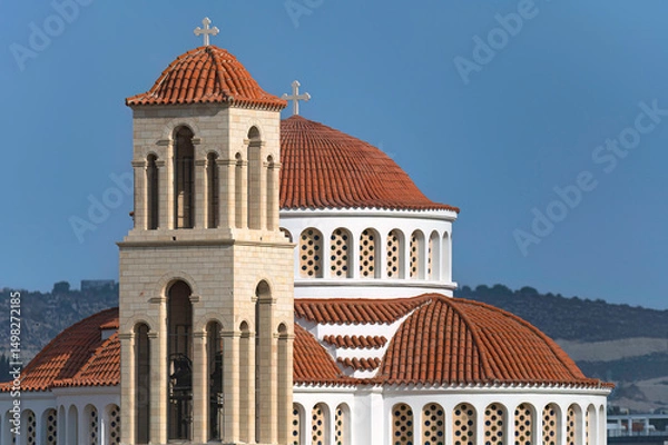 Obraz Church of Agion Anargyron showing its bell tower and red tiled domes in Paphos, Cyprus
