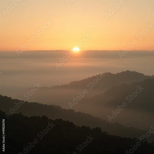Obraz Tranquil sunrise over misty hills bathed in warm oranges and soft greens Perfect for serene nature or calming landscape concepts
