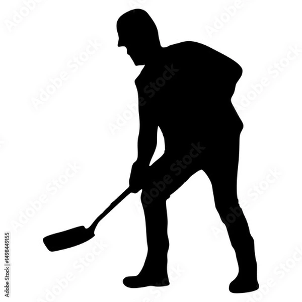 Fototapeta Silhouette of a Man Shoveling