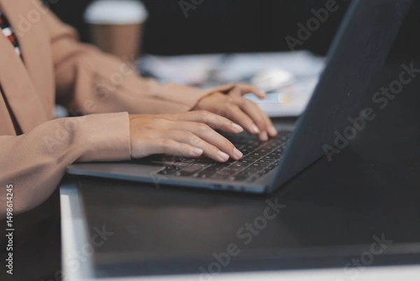 Fototapeta Business people team working at office with tablet and document, doing planning analyzing the financial report, business plan investment, finance analysis concept. Economic business discussions.