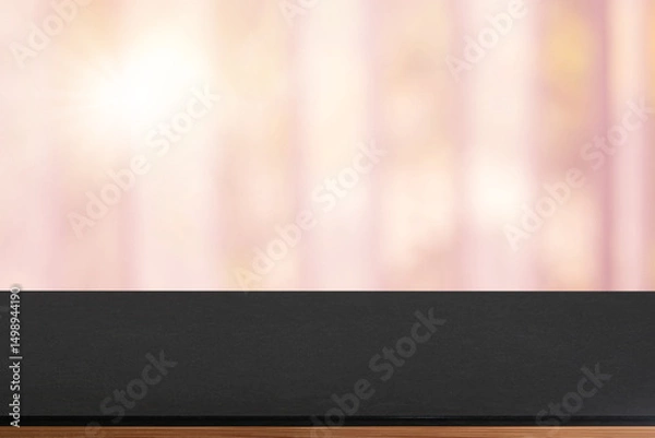 Fototapeta Empty wooden tray on perspective wooden table on top over blur flower background. Can be used mock up for montage products display or design layout.