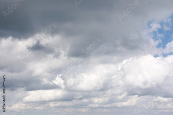 Fototapeta grey cumulus cloudscape of overcast sky. dramatic meteorology background. cloudy weather forecast in summer before the rain