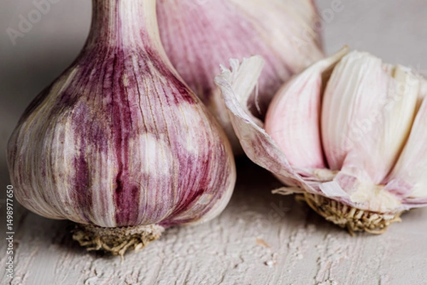 Obraz Fresh garlic bulbs on rustic white background
