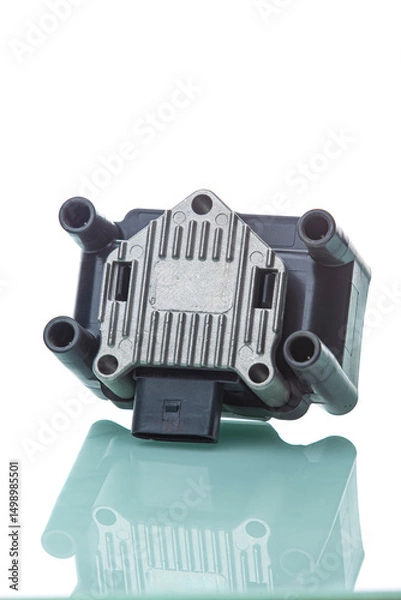 Fototapeta Automotive Repairing Concepts. Set of New Car Ignition Coil Placed Over Pure White