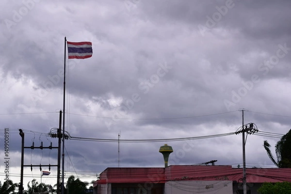 Obraz Thai flag blowing in the wind , Thai flag blowing in the wind and storm cloud background