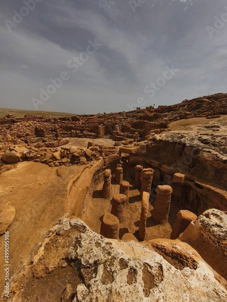 Fototapeta Karahan Tepe, an archaeological site in Sanliurfa, Turkey. The site is close to Gobekli Tepe and archaeologists have also uncovered T shaped stelae there and believe that the sites are related.