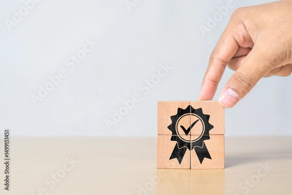 Obraz businessman's hand completed sign of top service quality assurance, guarantee, standards, ISO certification and standardization concept, advertising product and service quality commitment