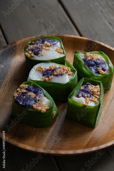 Fototapeta ube kalamay is a famous delicacy in the Philippines that uses glutinous rice flour and real ube paste and molds it into tiny bits