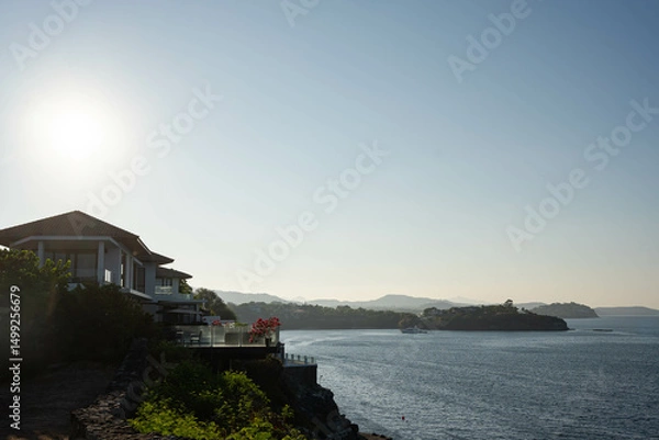 Fototapeta houses by the cliff overlooking nasugbu bay
