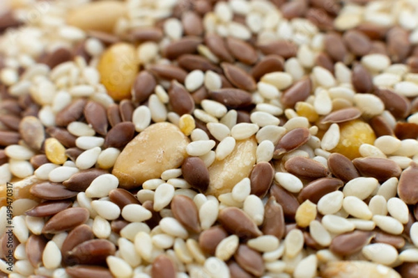 Obraz Macro close-up different seeds salad preparation. Healthy food. Veganism