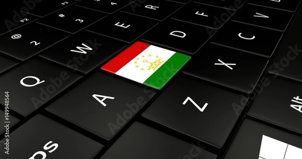 Fototapeta Close up of Tajikistan flag button on laptop keyboard.