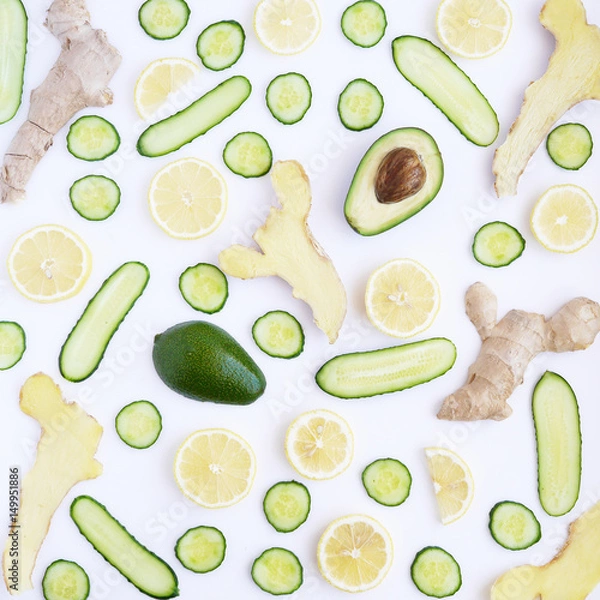 Fototapeta Pattern of fresh cut vegetables and fruits. Abstract food background.