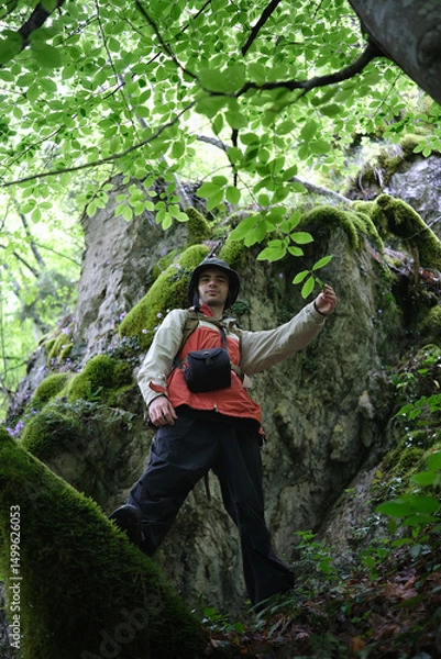 Obraz Hiker Exploring Mossy Cliffside on Olympus Mountain
