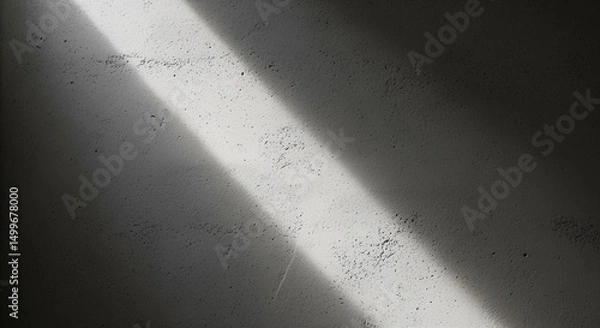 Obraz Bright diagonal light beams creating strong shadows on textured concrete wall surface background