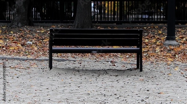 Fototapeta Autumn Park Bench with Sandy Ground.