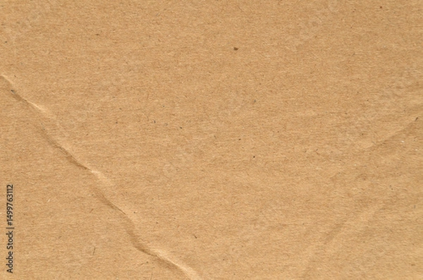 Fototapeta Brown craft paper texture with natural creases