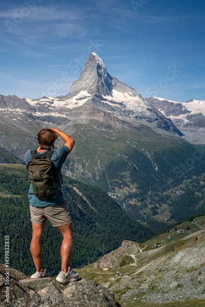 Obraz Boy taking pictures of the Matterhorn, Switzerland