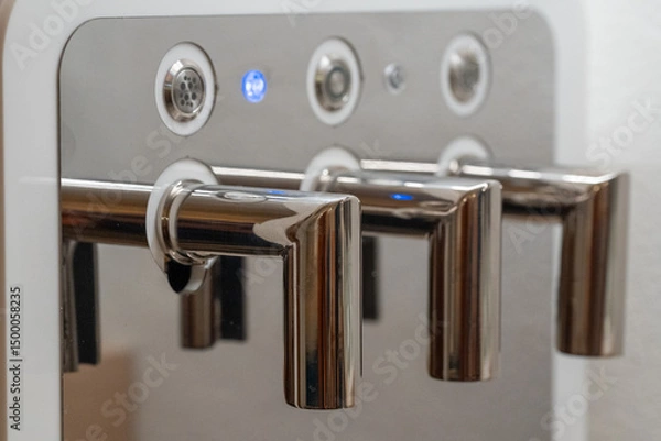 Fototapeta Elegant water dispenser in a dining area for customers’ convenience