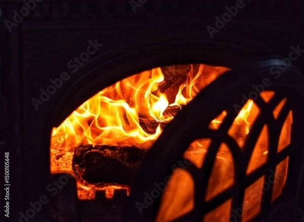 Obraz fire in the fireplace with the door open