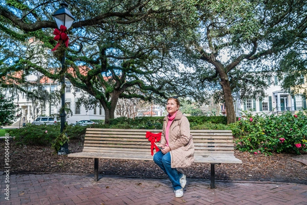 Obraz Woman on a bench in the park