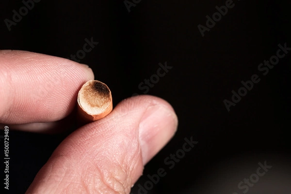 Obraz Burning cigarette with smoke and concept of cigarettes 