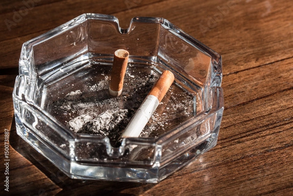 Obraz Burning cigarette with smoke and concept of cigarettes 