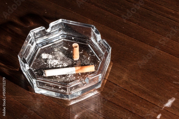 Obraz Burning cigarette with smoke and concept of cigarettes 