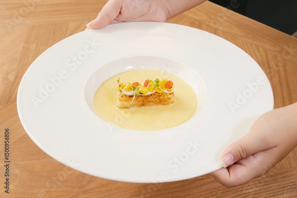 Fototapeta Fine Dining Cream Soup with Gourmet Garnish on White Plate