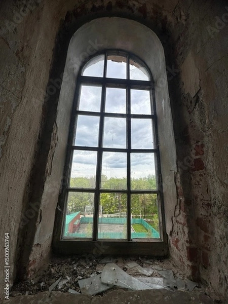 Fototapeta A window with a view of a park