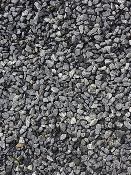 Obraz Gravel texture with small, irregular stones in shades of gray, ideal for landscaping and construction projects. natural appearance adds rustic touch to outdoor spaces