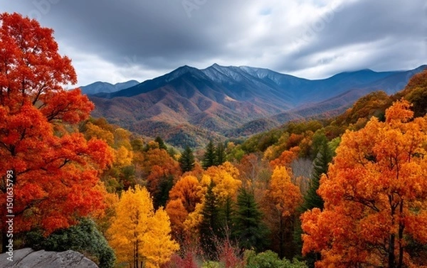 Fototapeta Fiery autumnal vista mountains and clouds