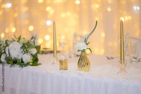 Fototapeta wedding table with exclusive floral arrangement prepared for reception, wedding or event centerpiece in greenery style