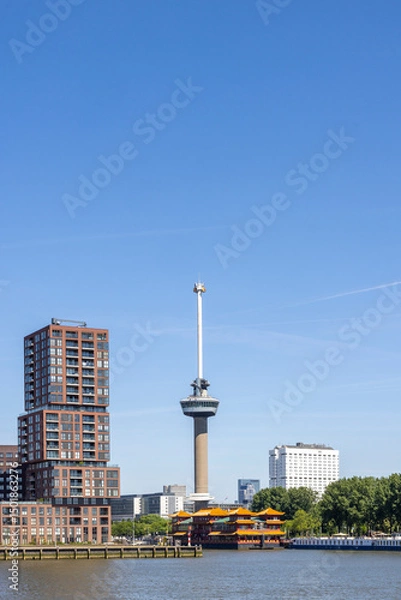 Fototapeta CSkyline with famous Euromast tower and floating Chinese restaurant in Rotterdam The Netherlands