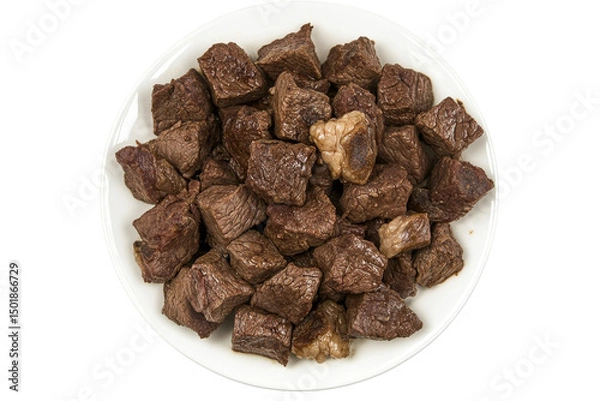 Obraz Diced beef cubes on a white plate presented against a white background