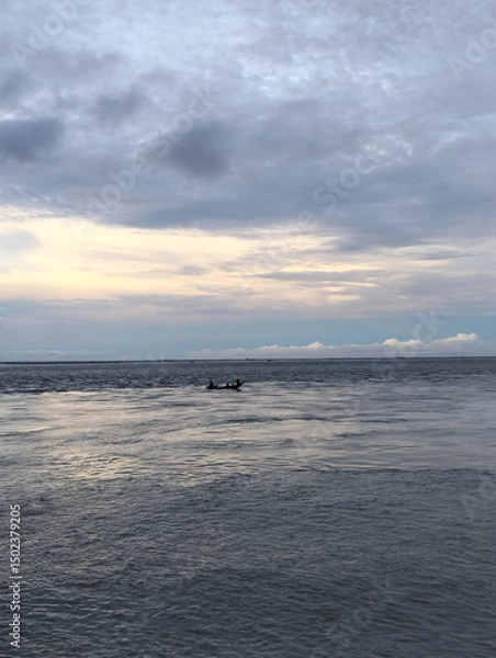 Fototapeta Cloudy sky and riverside view