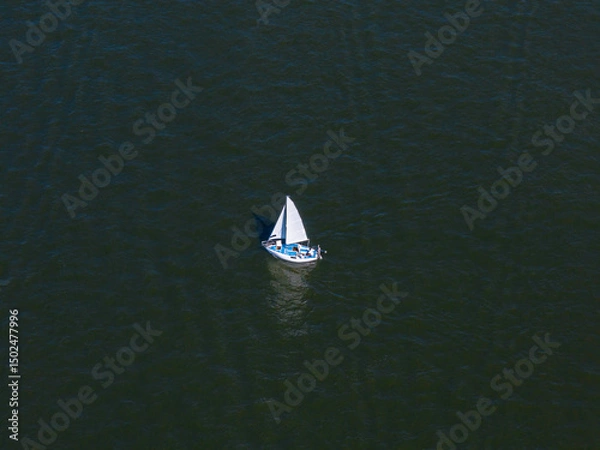 Obraz Aerial View of a Sailboat on Open Water