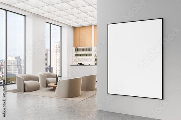 Fototapeta Framed blank poster mockup on clean wall in bright modern interior with cozy seating and city view through large windows in spacious layout. 3D Rendering
