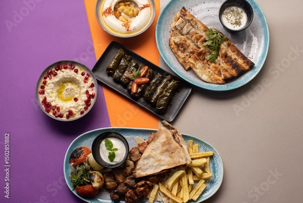 Fototapeta Traditional Lebanese mezze and grill platter with colorful, vibrant presentation.