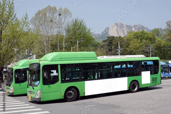 Fototapeta Bus parked in garage in Seoul, Bus billboards