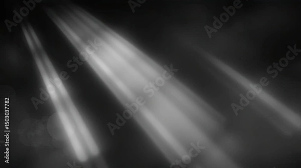 Fototapeta Abstract monochrome image featuring diagonal light rays against a dark background