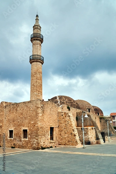 Obraz stone, historic minaret of the Turkish mosque in the city of Rethymnon on the island of Crete