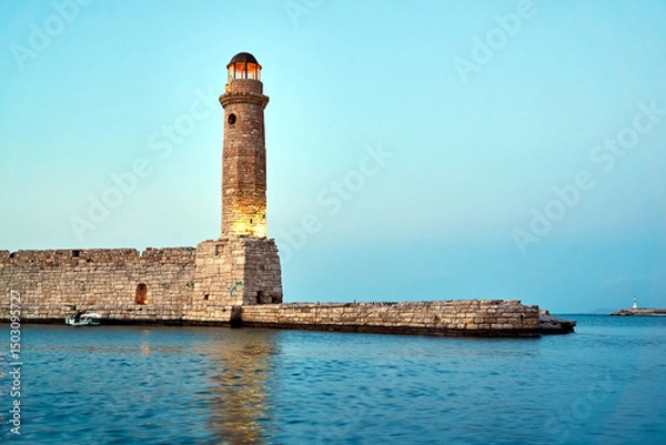 Obraz stone, historic lighthouse in the port of Rethymnon on the island of Crete