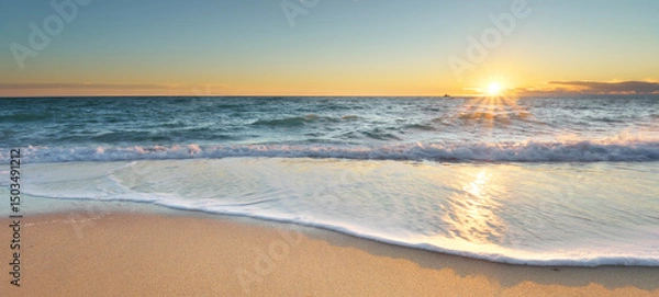 Obraz Sandy beach at sunset.